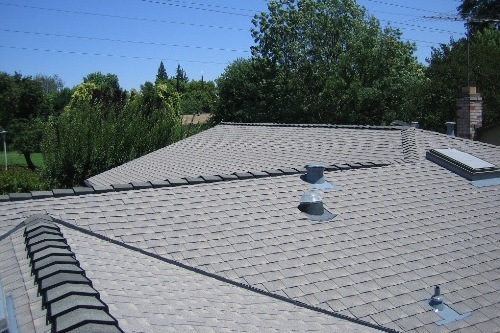 Elk (now owned by GAF) was one of the first companies to come out with a dedicated “Cool Shingle” line. This is one of the earliest installations of that Cool Shingle line and now every composition shingle manufacturer has a “cool color” or “Energy Star” rated shingle, and with varying colors to choose from.
